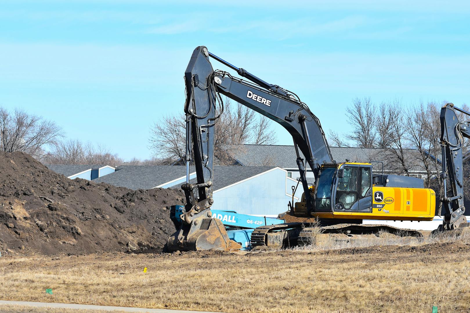 A. Davis Backhoe Service — Excavation work on a Texas job site
